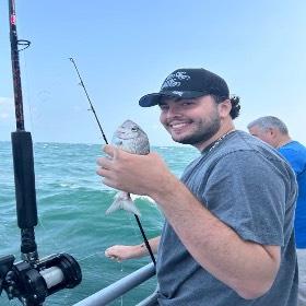 Justin holding a fish